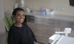 smiling woman at dentist
